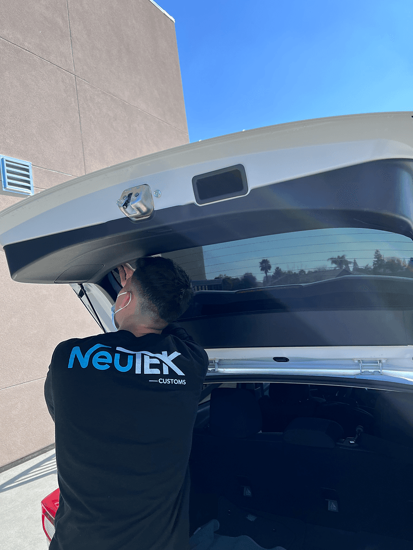 NeuTEK Customs technician working at the shop